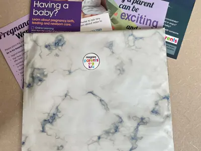 A package of flyers and resources for new parents